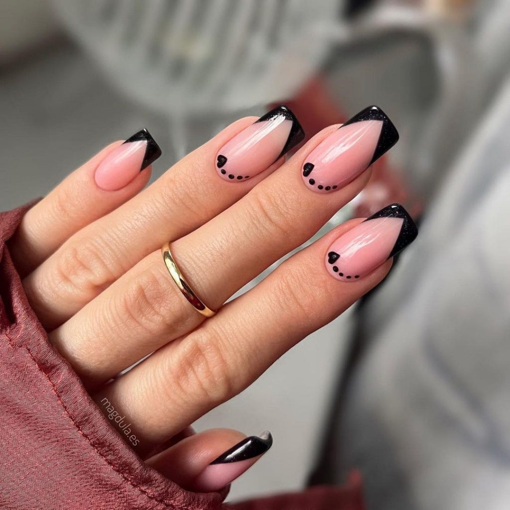  This fantastic heart nail design and a black French look will look spectacular