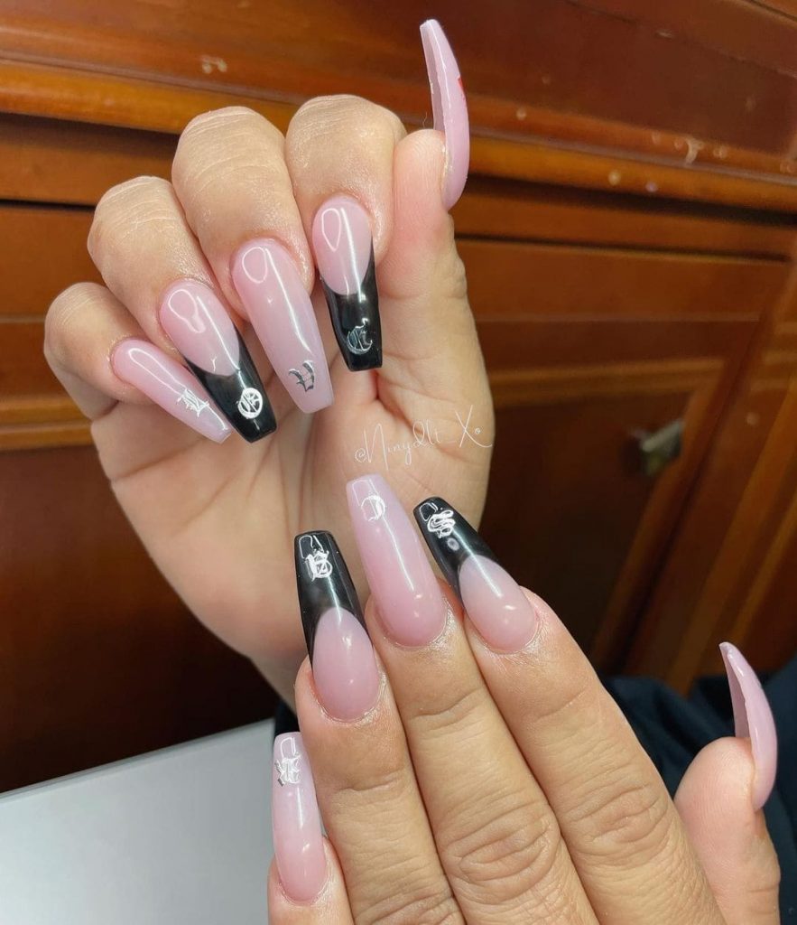 The Black band design for pink nails makes this nail design perfect for valentine