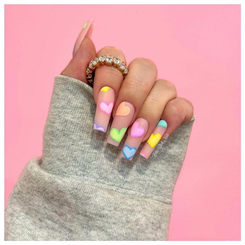 This nail design's differently colored love patterns will guarantee you a unique and spectacular feeling