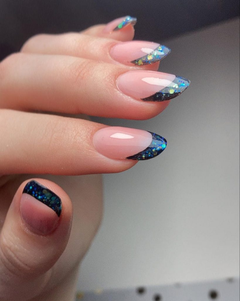 The star patterns and black bands make this nail design perfect for valentine