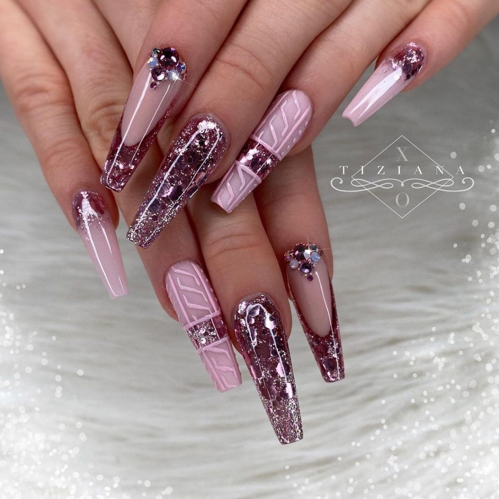 Do you fancy long nails? This multi-colored design will wow you