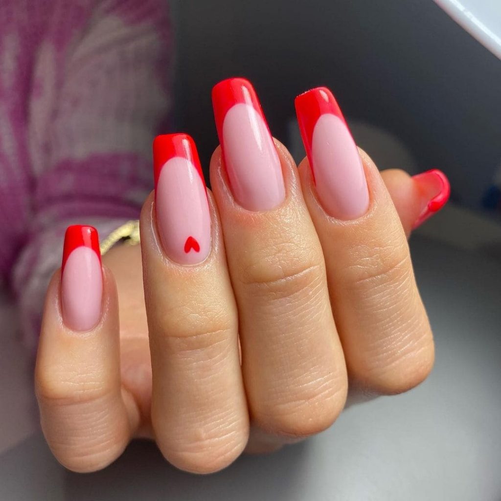 A French look with a red band and a small heart on your ring finger will be outstanding.