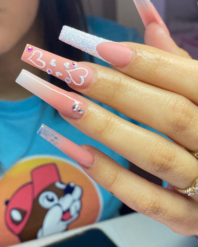  This heart nail design will be amazing if you love long nails.