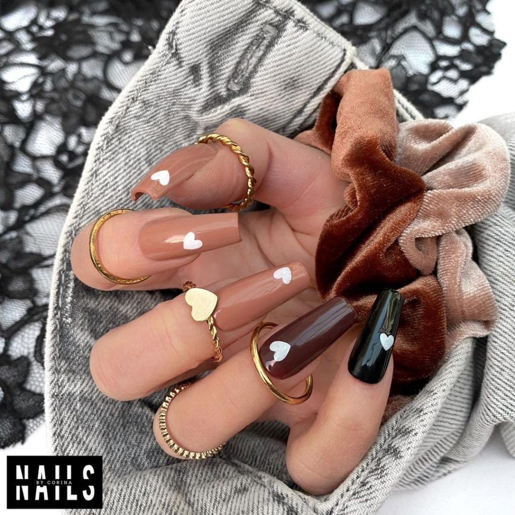Do you love black or brown nail designs? This design will quench all your thirst in a single heart nail design