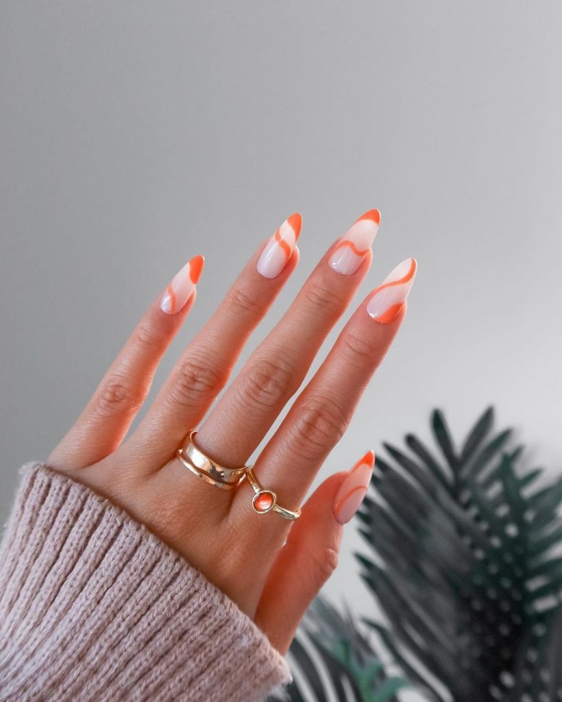  These Orange and White Abstract Swirl Nails for December inspo