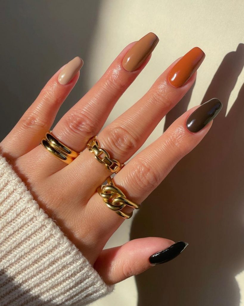 These Gorgeous Skittle nails are perfect for a holiday festive vibe