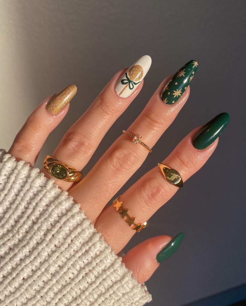  These Green and Gold duo are a Christmas nail color vibe