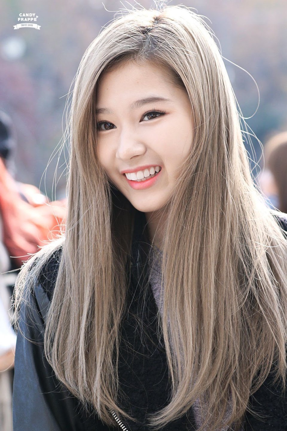 Dark skin Sana TWICE with smoky brown hair color