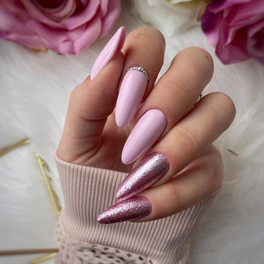 Light Pink Almond Nails With Flakes